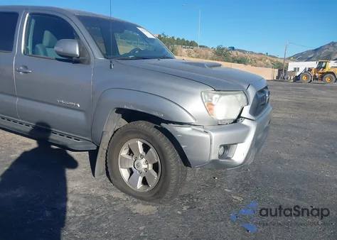 2015 Toyota Tacoma Prerunner V6 z USA, uszkodzony, nr VIN 3TMJU4GN2FM185093